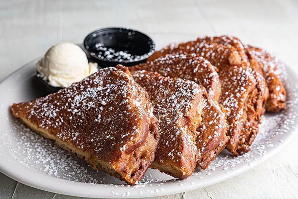Chompie'S French Toast · Our original “New York” style thick-sliced Challah dipped in batter and deep-fried until golden brown