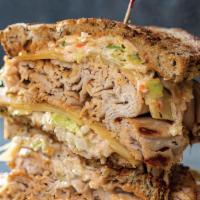 Frank'S Fowl Ball · Hot sliced turkey breast, Coleslaw, Swiss cheese, and 1000 Island dressing on grilled Rye. S...