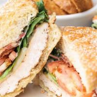 Classic Chicken Sandwich · Charbroiled chicken breast with lettuce, tomato, and sliced red onion. Served with Coleslaw ...