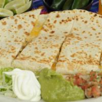 Ole'S Quesadilla · Melted cheese with your choice of meot griled in a flour tortilla with a side of lettuce, so...