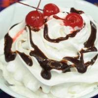 Fried Ice Cream · Breaded ice cream that is quickly deep-fried. Served with whip cream, chocolate sauce, and a...