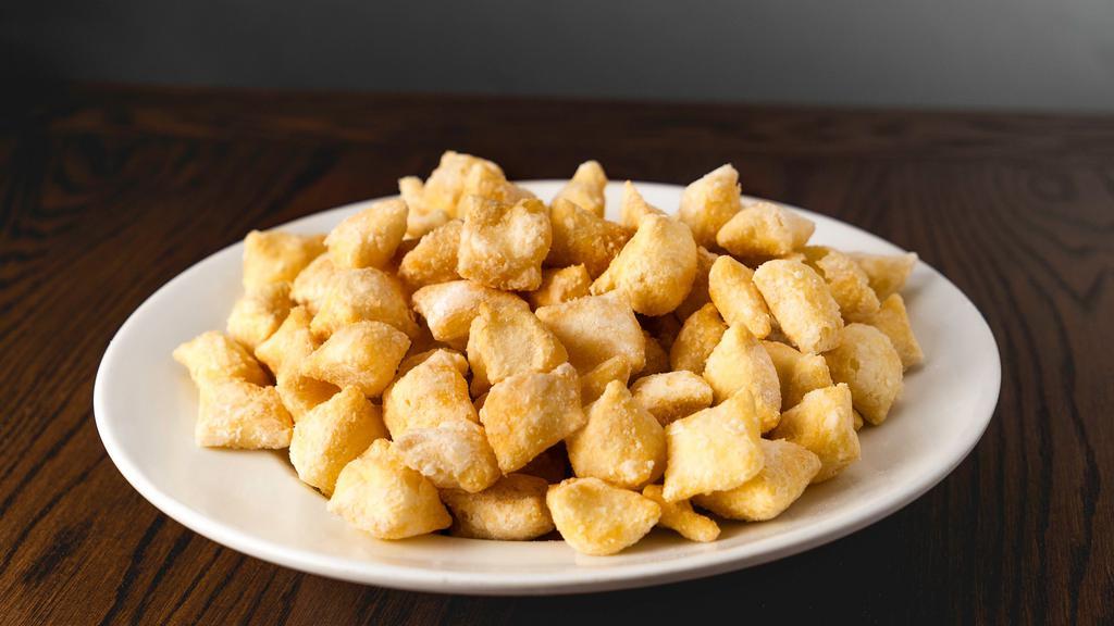 Dough Nuggets (Serves 6) · Deep Fried dough treats covered in powered sugar. 330 cal. per serving. (6 servings).