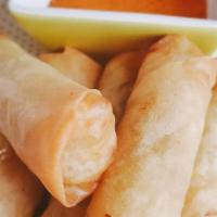 Egg Rolls · Crispy homemade Egg Rolls filled with seasoned vegetable and glass noodle.  Served with home...