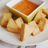 Fried Tofu · Crispy fried tofu served with homemade sweet and sour sauce. (Gluten Free)