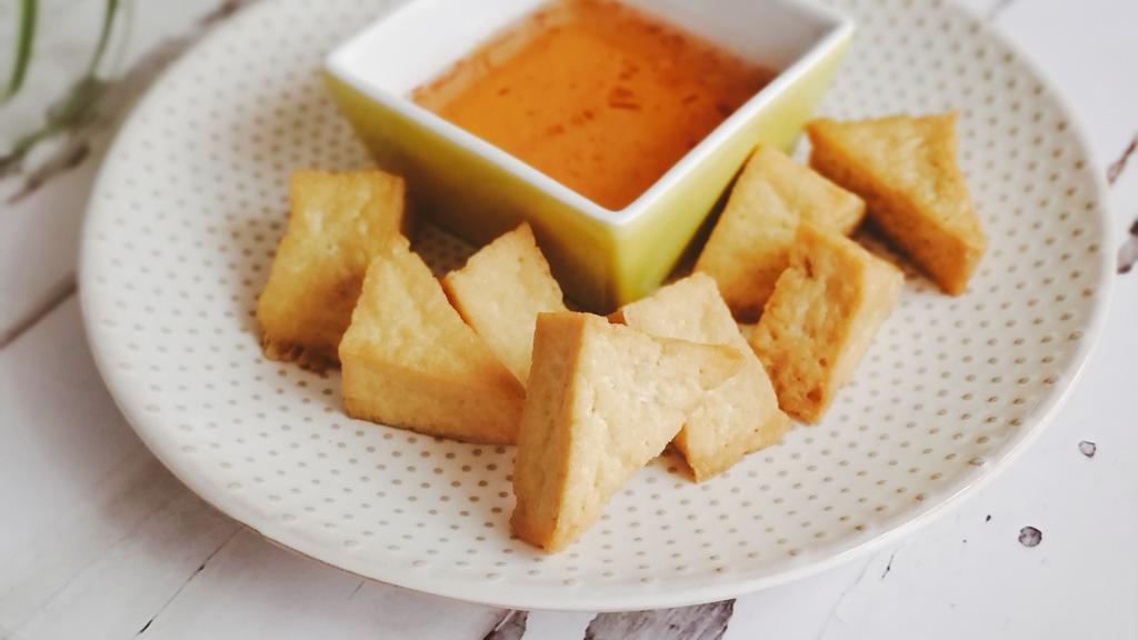 Fried Tofu · Crispy fried tofu served with homemade sweet and sour sauce. (Gluten Free)