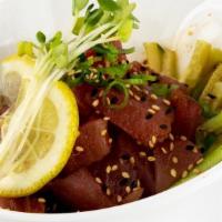 Poke Salad · Cubed tuna, julienned cucumbers, seaweed salad and green onions drizzled with our house poke...