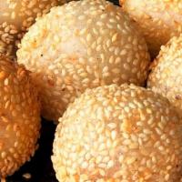 Sesame Balls · Six deep-fried Japanese pastry, filled with red bean paste, coated with sesame seeds.