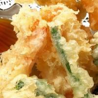 Tempura Vegetable (12) · Lightly battered and fried broccoli, onion, carrot, yam, served with sweet tempura sauce. (1...