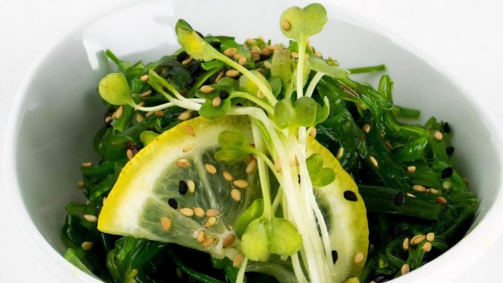 Seaweed Salad · Thin marinated slices of wakame seaweed mixed with sesame seeds.