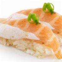 Salmon Belly Nigiri /Toro · Consuming raw or undercooked seafood, or shellfish may increase your risk of foodborne illne...