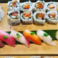Combo C · Eight pcs spicy tuna roll, five pcs nigiri (chef’s choice) and side of small seaweed salad, ...