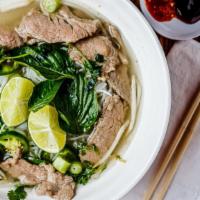 Rare Steak Pho · Rare Steak, Rice Noodle Served with Bean Sprout, Basil, Lime slice, Jalapeno