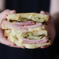 Hot Ham And Cheese Platforms · Smoked ham, cheddar and havarti, dijonnaise, house made pickles, on toasted sourdough.