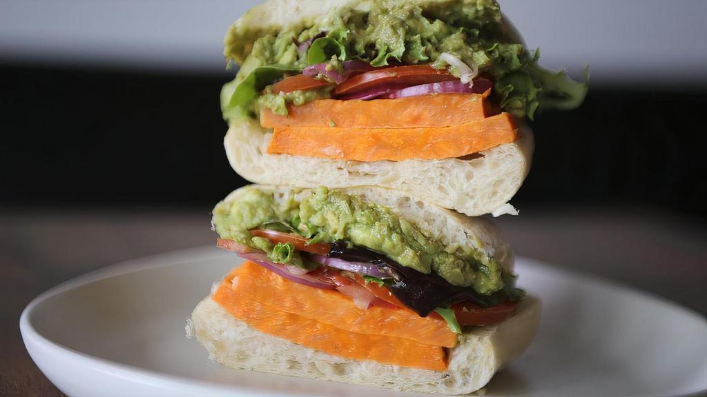 Veggie Sandwich Platforms · Roasted sweet potato, avocado mash, sliced tomato, red onions, dressed greens, on ciabatta.