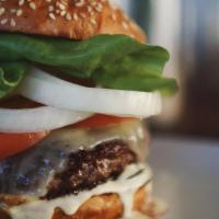 Worth Burger Platforms · Half pound burger patty with cheddar, sriracha aioli, lettuce, tomato, onion, and house made...