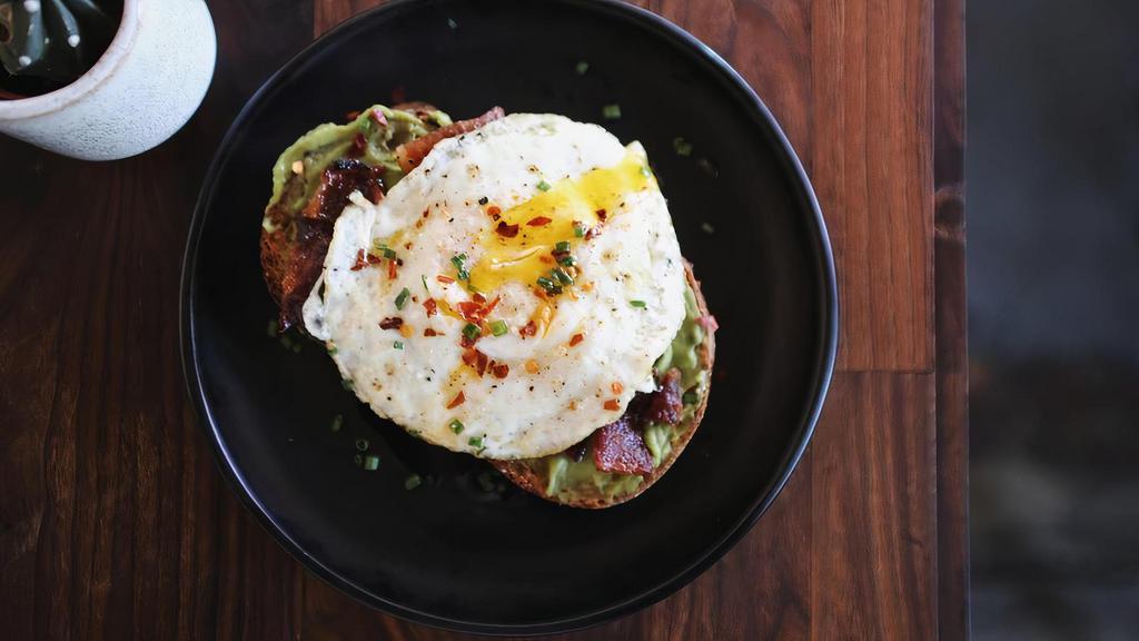 Avocado Toast (Weekends Only 9Am - Noon) Platforms · Toasted country loaf, avocado spread, olive oil, flakey sea salt, oven, red pepper, Sriracha candied bacon, over easy egg.