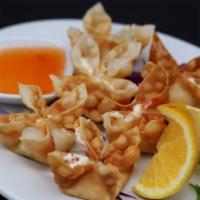 Crab Cheese Wontons (6) (Delivery) · A mixture of imitation crab meat, cream cheese, carrots. Served with thin sweet and sour sau...