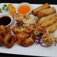 Combo Appetizer (Delivery) · This combination appetizer features 
Thai Egg Rolls (2)
Crab Cheese Wontons (4)
Calamari (3)...