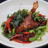Spicy Basil Duck (Pad Kra Prao Ped) (Delivery) · Roasted duck stir-fried with house special sauce, basil leaves, fresh chili, jalapeño, and r...