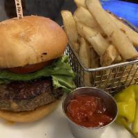 Juicy Lucy Stuffed Burger · Our handmade black Angus patty, stuffed with American cheese, apple wood bacon, chorizo and ...