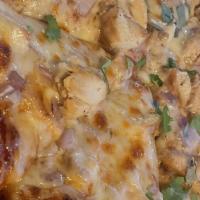 Bbq Chicken Pizza · Chunks of grilled chicken breast, barbecue sauce, sliced red onions, mozzarella cheese and f...