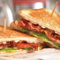 Bacon, Lettuce & Tomato Sandwich · Applewood smoked bacon, lettuce, tomato and mayonnaise on sourdough bread.