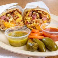Breakfast Burrito · Eggs, hash browns, and cheese rolled into a twelve inch flour tortilla.