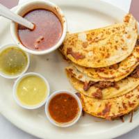 3 Tacos De Birria  · Served with consome.