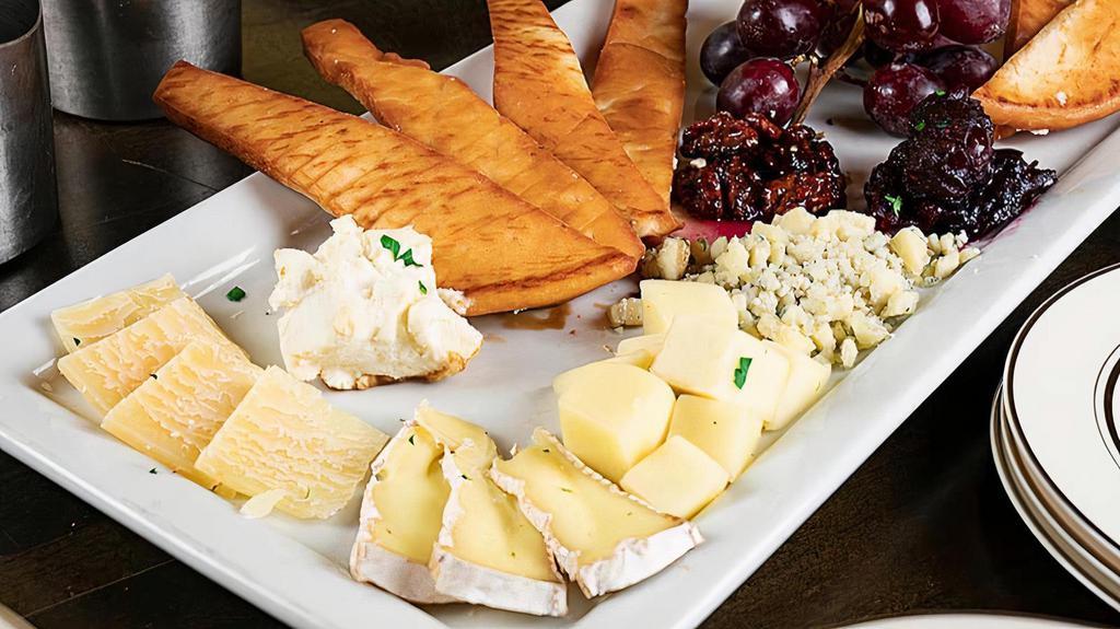 Cheese Platter · Assortment cheese of Gouda, Brie, Ricotta, Gorgonzola, Parmesan, fresh grapes, fried pita bread, candied walnut, honey