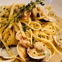 Clam Linguini · White wine, clam juice, garlic, chili flake, butter, herbs