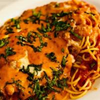Chicken Parmesan · Sauced with vodka sauce, served with spaghetti marinara