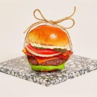 Bacon Cheeseburger Slider · Juicy beef patty with crispy bacon, melted cheddar cheese, lettuce, tomato, onion, pickles, ...