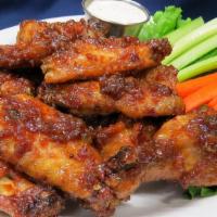 Wings · Our smoked wings are deep fried and tossed in your choice of sauce:  Sweet Chili, Franks Red...