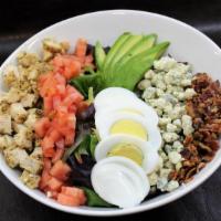 Cobb Salad · Chicken breast, avocado, crispy bacon, chopped hard-boiled egg, crumbled bleu cheese, and di...