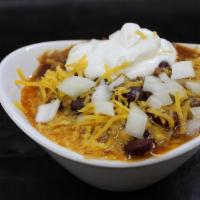 Chili · Our rich and meaty red bean chili served with onions, cheddar cheese, sour cream, and cornbr...