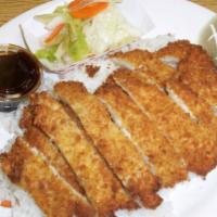 Chicken Katsu · Panko breaded fried cripy white chicken with rice and vegetables. Sauce will be on side.