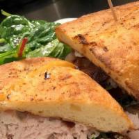 Sonoran Sandwich · Sandwich on flatbread or tortilla. Turkey, bacon, avocado, tomato, lettuce, rosemary mayo, p...