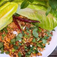 Nam Khao · Gluten-Free. Lao crispy rice salad specially seasoned with fresh herbs and lime juice. Serve...