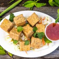 Pepper Salted Tofu · Gluten-free. Crispy fried pepper salted tofu, served with sweet chili sauce.