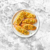 Cheesy Mood Bread · Fresh gluten free garlic baguette topped with mozzarella and parmesan. Served with our home ...