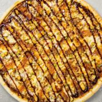 Rooster Rumbo Bbq Pizza (12 In.) · Tender BBQ chicken breast, onions, parmesan cheese.
