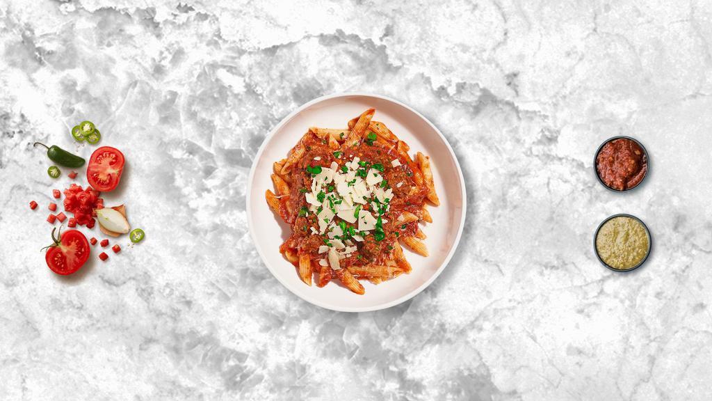Spicy Sausage Pasta (Penne) · Penne pasta with homemade pork sausage, sauteed onions, a touch of chili flakes, in a tomato cream sauce.