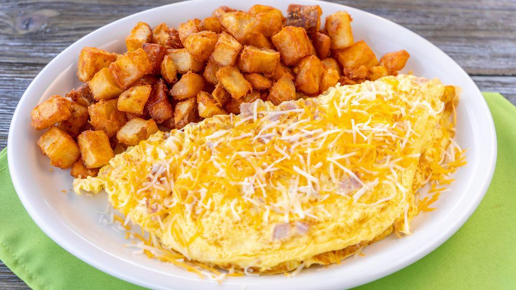 Classic Omelette · Cheese your choice of bacon, ham or sausage.
