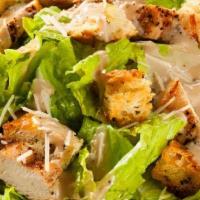 Chicken Caesar Salad · Grilled chicken, romaine lettuce tossed with Caesar dressing and parmesan cheese.