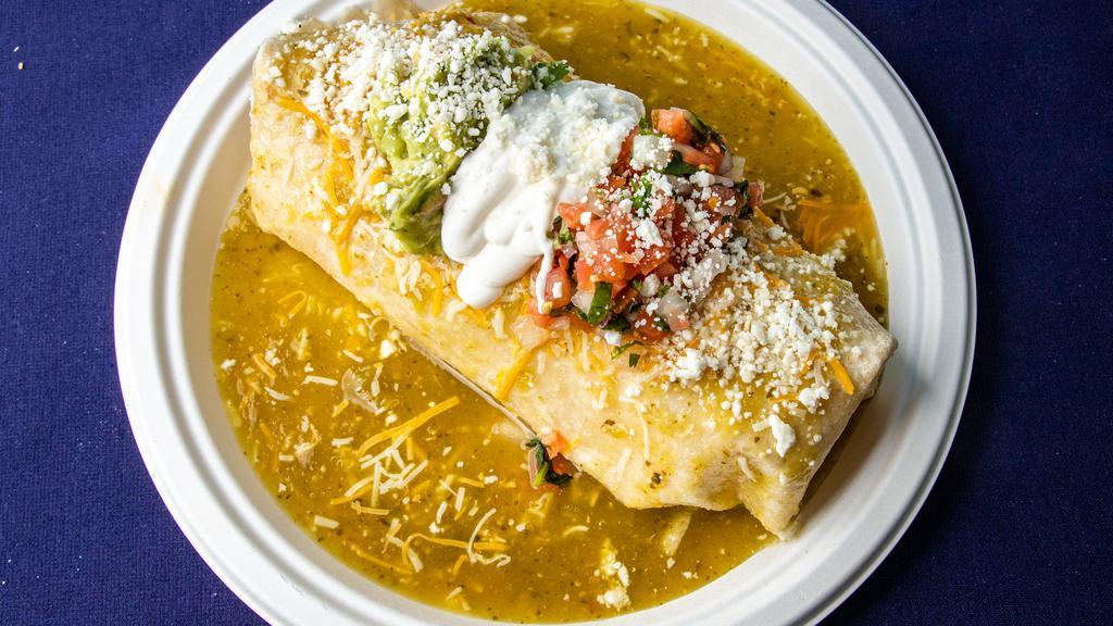 Wet Or Dry Burrito · Rice and beans, three quesos, tomatillo, pico, and guac.