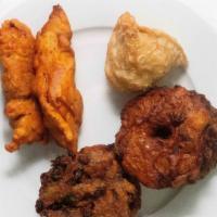 Assorted Fritters · Vegetable samosa (1), onion pakora (2), vegetable pakora (2) & chicken pakora (2).