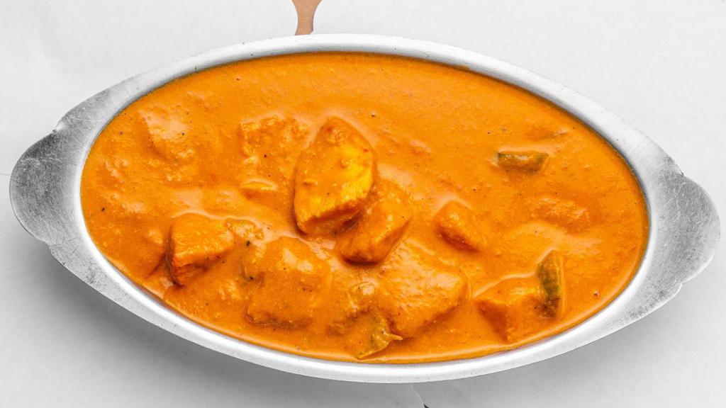 Chicken Tikka Masala · Chicken breast barbecued and cooked in creamy sauce with finely chopped bell pepper.