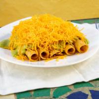 5 Rolled Tacos Cheese With Guacamole · Shredded beef rolled tacos topped with guacamole and cheese.