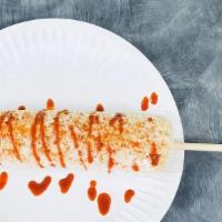 Corn On The Cob (Entero) · Serve with mayonnaise, butter, powder cheese, Valentina hot sauce and chili powder.