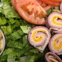 Chef Salad · Fresh greens, turkey, ham, provolone, cheddar, tomatoes and dressing.